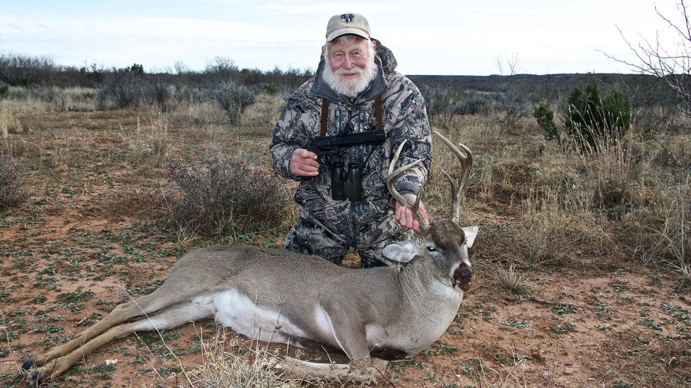 Larry with his ancient 6-point taken while hunting with Double A Outfitters.
